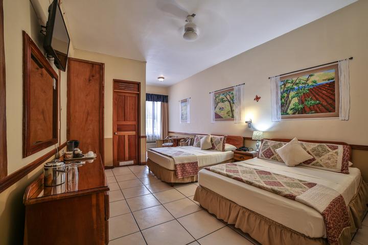 Room with two beds at a hotel in Costa Rica's Central Valley