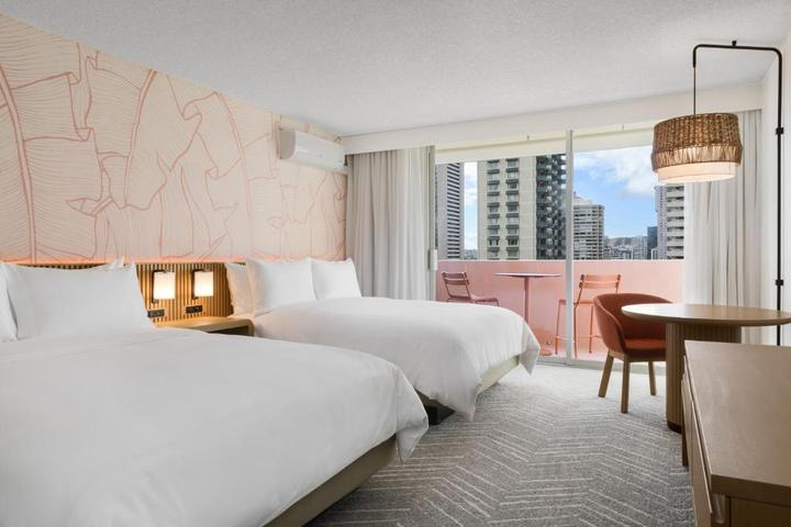 Hotel room with two beds and city views in Honolulu