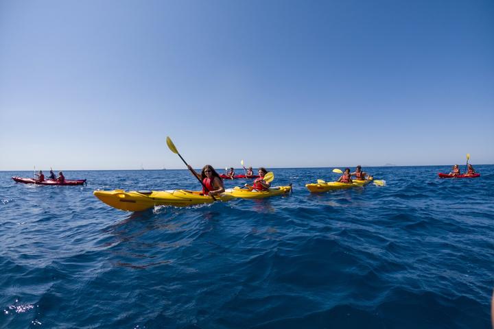 Teens sea kayaking on the Aegean