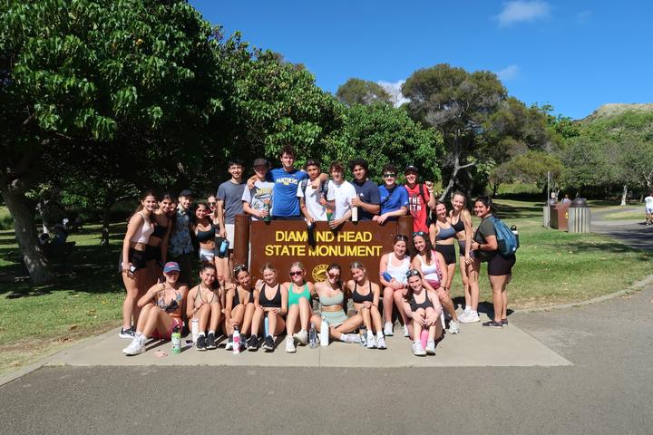 The group at the Diamond Head State Monument sign