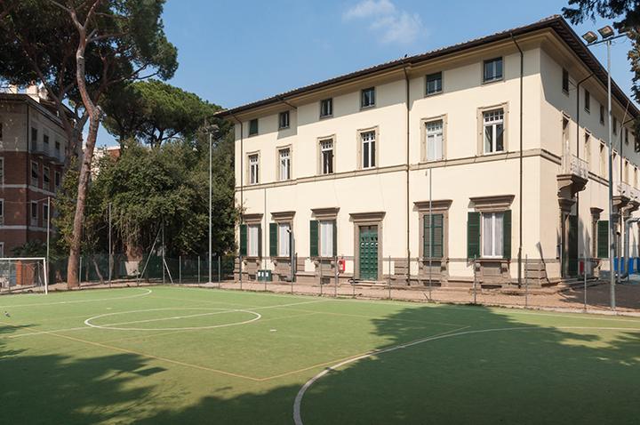 The school building and its five-a-side football pitch