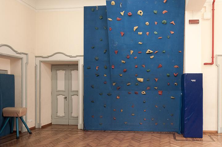 The indoor climbing wall in the school gym