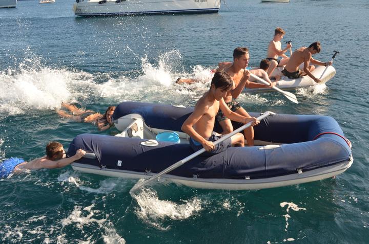 Campers splashing around the dinghy