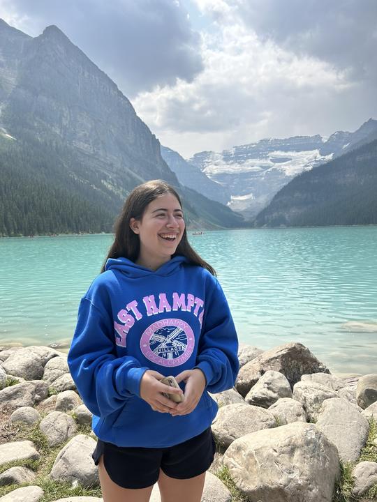 A girl on the shore of Lake Louise