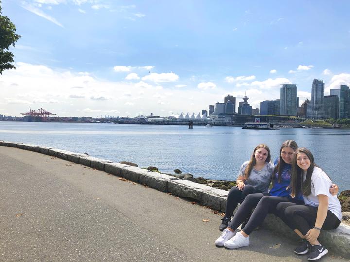 Three girls on the seawall in Vancouver