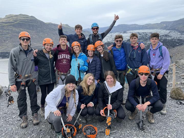 The group with ice axes after a glacier hike in Iceland