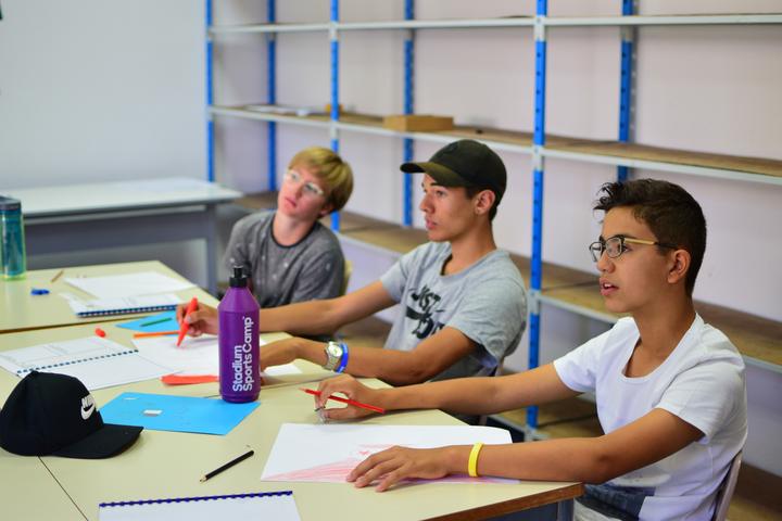 Campers working in a language class
