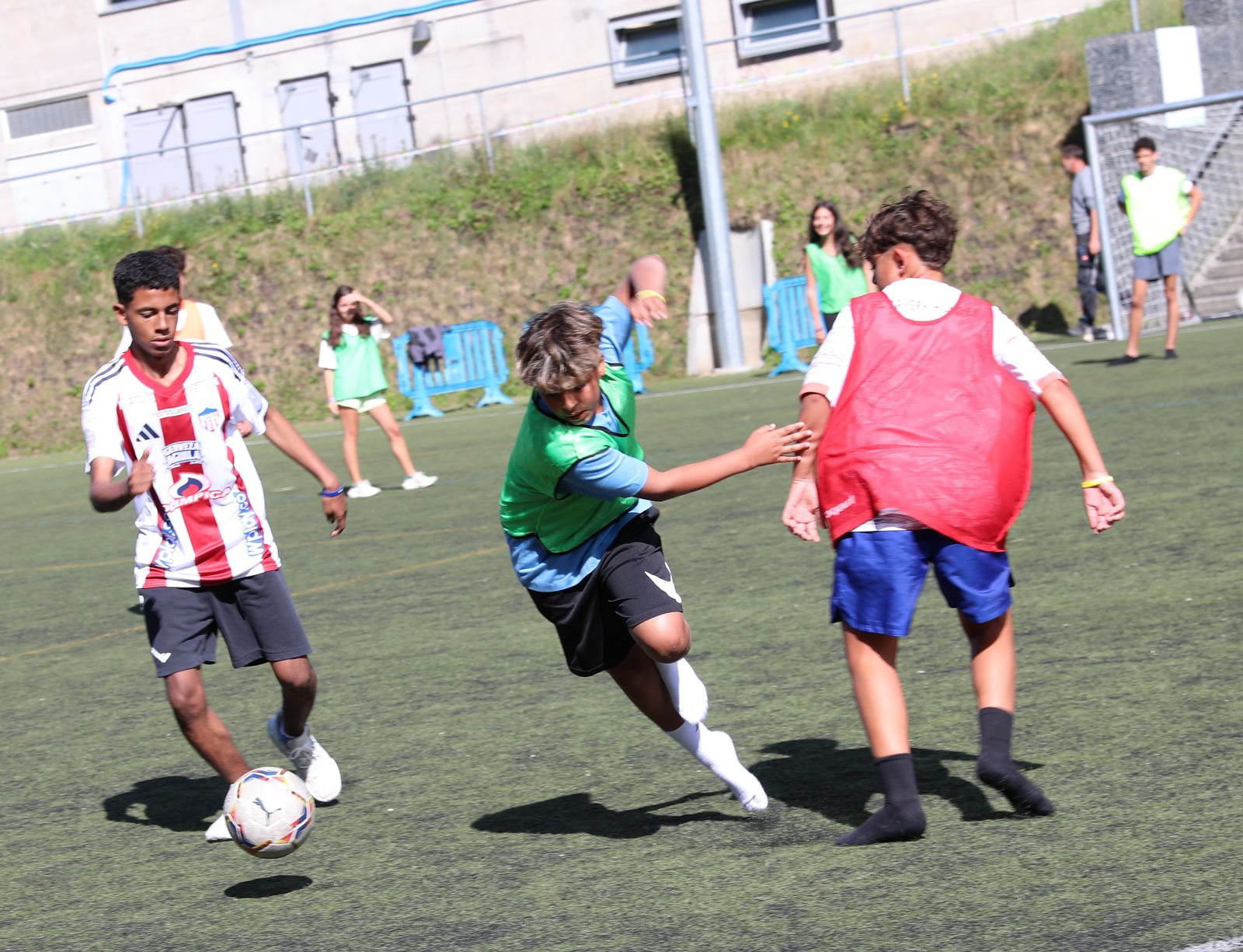 Campers playing a fast game of football