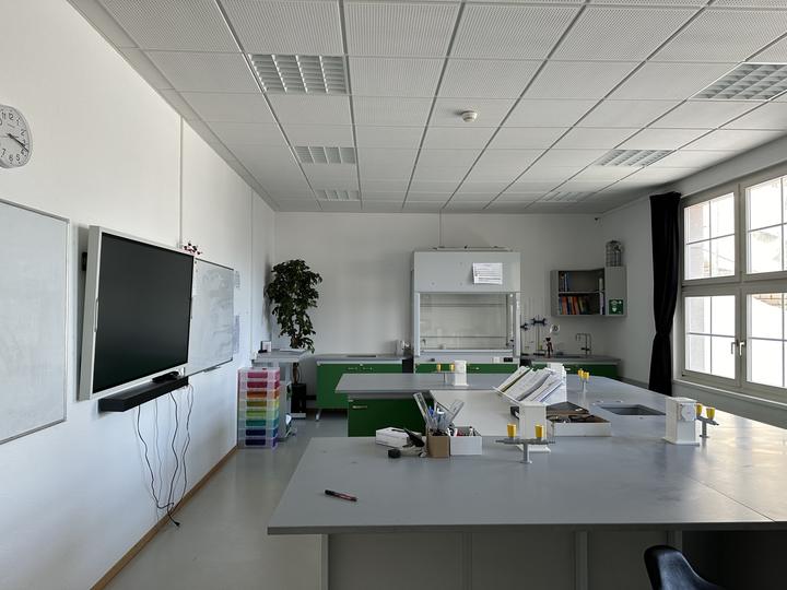 Workbenches and screens in the camp's science room