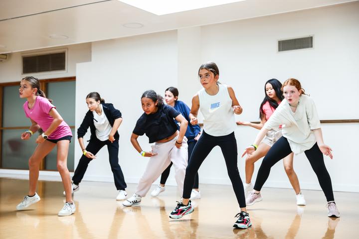 A group of dancers mid-routine