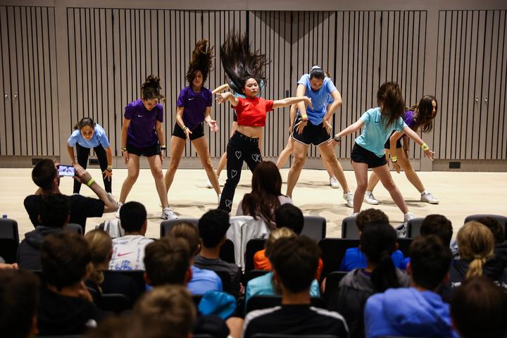 Dancers performing a routine for the rest of the camp