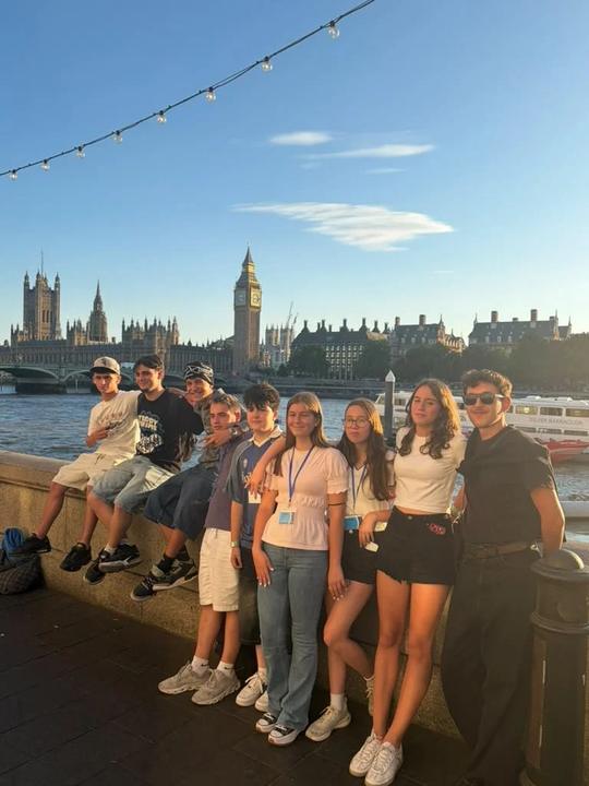 Campers by the Thames with Big Ben in the evening