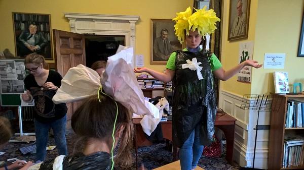 Students in costumes getting ready for the fashion show