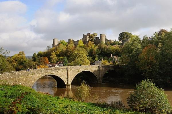 Ludlow Castle above the river and the old stone bridge