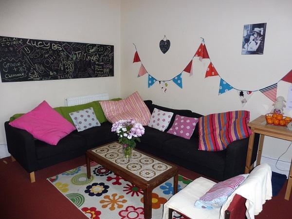 The girls' common room, with sofas and cushions