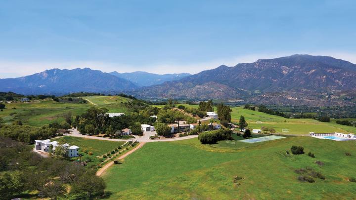 Aerial view of the hilltop campus with the Ojai mountains behind