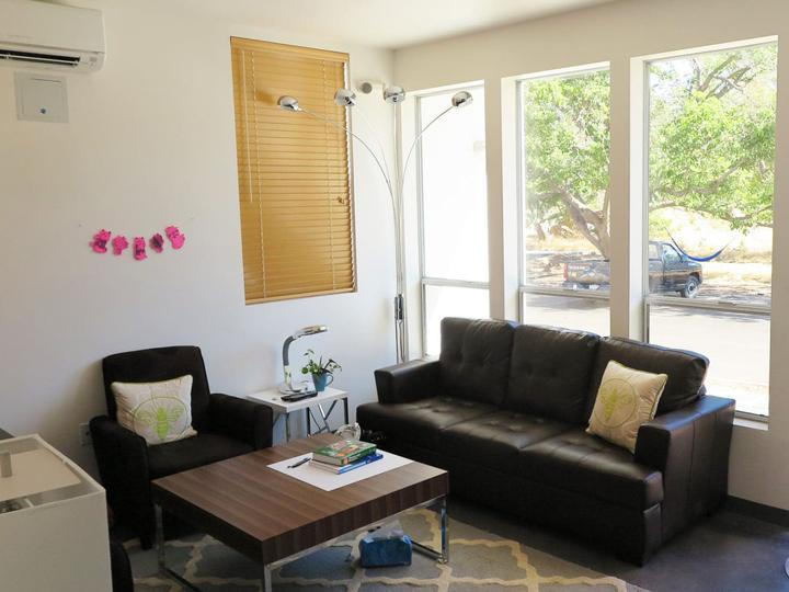 Bright dorm living room with sofas