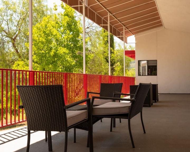 Covered dorm patio with outdoor seating