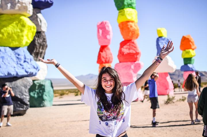 A girl at the Seven Magic Mountains outside Las Vegas
