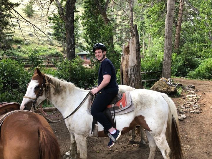 A teen on horseback in Cody, Wyoming