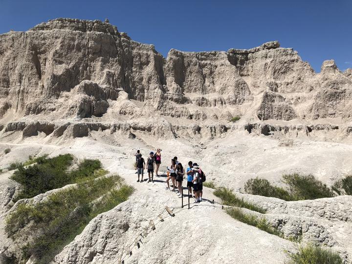 Hiking among the pale rock formations of the South Dakota Badlands