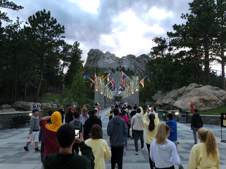The group walking up to Mount Rushmore