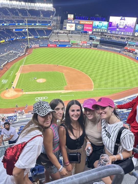 Friends at a night game at Yankee Stadium